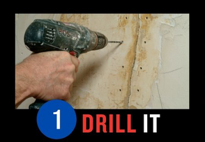Hand holding a drill against a wall with drill bit, demonstrating the step '1 DRILL IT' in a DIY project.