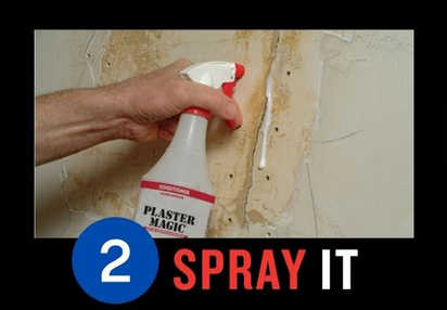 Hand spraying Plaster Magic on damaged wall repair, step two in restoration process.