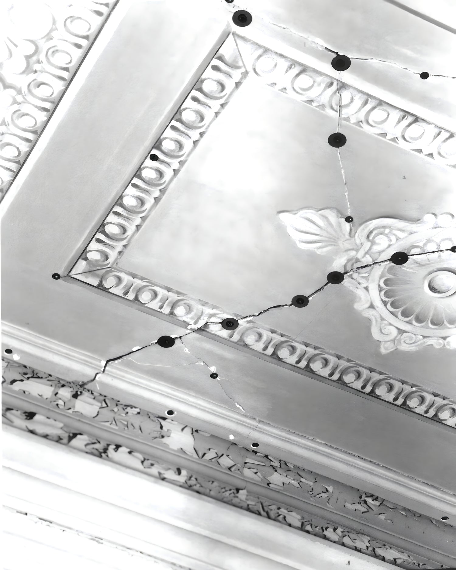 Decorative ceiling with intricate patterns and molding