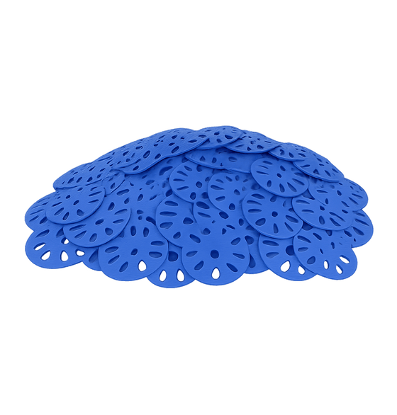 Blue silicone coasters with cut-out designs on a white background