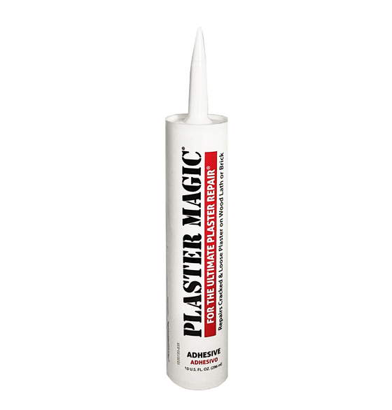 Plaster Magic adhesive tube on a white background