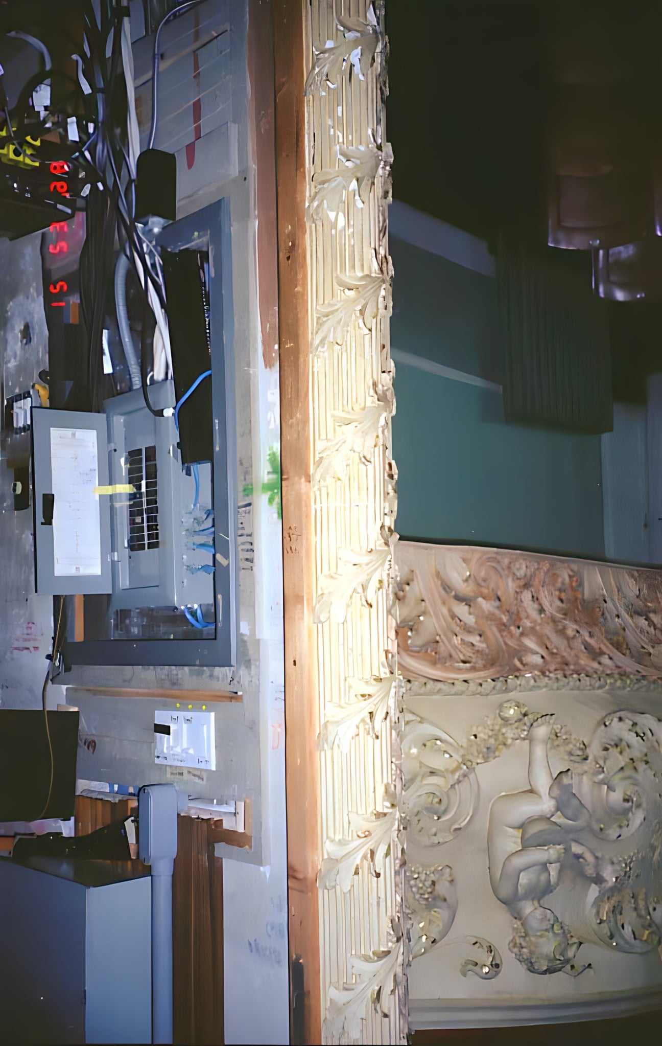 Technical setup with equipment and a decorative wall panel.